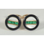 A GOOD PAIR OF 18CT GOLD AND EMERALD PEARL. BLACK CUFF LINKS.