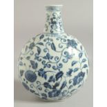 A CHINESE BLUE AND WHITE PORCELAIN MOON FLASK VASE, with flower heads and scrolling vine, bearing