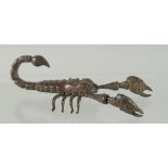 A JAPANESE BRONZE ARTICULATED SCORPION. 8cm long.