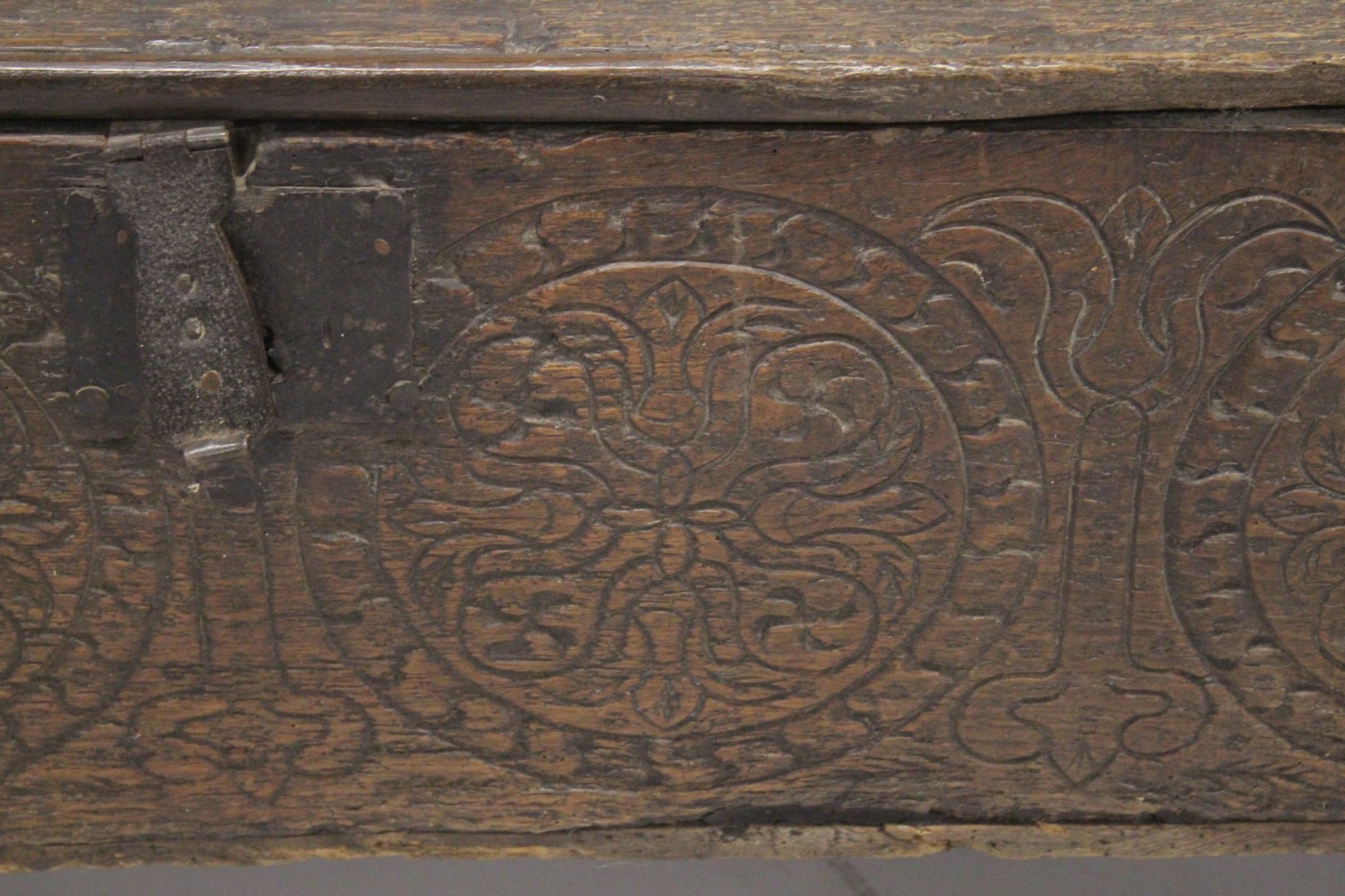 A VERY EARLY POSSIBLY 16TH CENTURY OAK SWORD CHEST with plain plank top and sides. The front with - Image 3 of 6