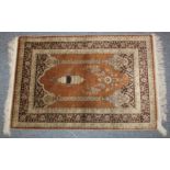 A GOOD SMALL PERSIAN SILK PRAYER RUG depicting a temple arch and lantern. 92cm x 61cm.