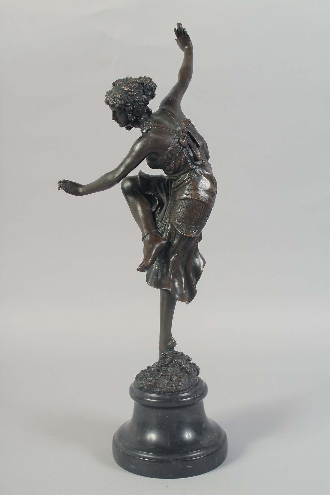 C. J. R. COLINET. A GOOD BRONZE OF A DANCER on a bed of flowers. Signed, 15.5ins on a circular - Image 2 of 6