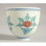 A CHINESE MING STYLE DOUCAI CUP. 5.5cm diameter.