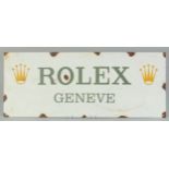 AN ENAMEL ROLEX SIGN. 9ins x 23ins.