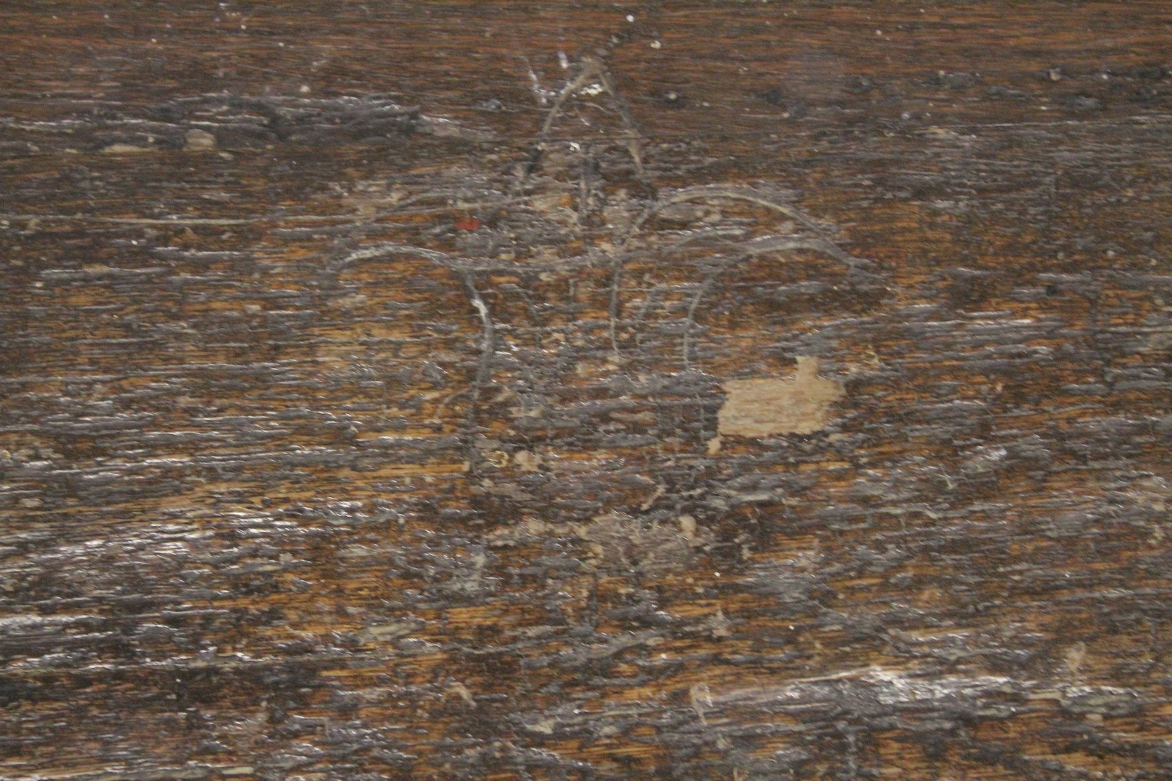 A VERY EARLY POSSIBLY 16TH CENTURY OAK SWORD CHEST with plain plank top and sides. The front with - Image 4 of 6