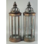 A LARGE PAIR OF COPPER CIRCULAR LANTERNS. 32ins high.