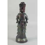 A CHINESE BRONZE AND CLOISONNE ENAMEL GUANYIN FIGURE. 13ins high.