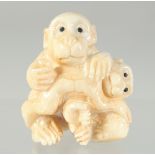 A CARVED BONE MONKEY NETSUKE. 4cm.