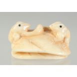 A CARVED BONE FROG NETSUKE. 4cm.