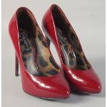 A PAIR OF DOLCE AND GABBANA RED HIGH HEEL SHOES. Size 37.