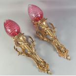 A GOOD PAIR OF LOUIS XVI DESIGN GILT BRONZE CORNET WALL SCONCES with ruby glass bowls.