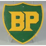 AN IRON B. P. SIGN, shield shaped. 13ins x 13ins.
