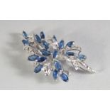 AN 18K WHITE GOLD SAPPHIRE AND DIAMOND BROOCH