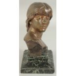 INGALBAIT. A GOLDSCHEIDER BRONZE BUST OF A YOUNG GIRL. Signed. 6.5ins high on a marble base.
