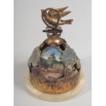 AN INTERESTING FRENCH CIRCULAR BELL with fruiting vines and three landscape scenes. 3.5ins diameter