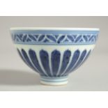 A CHINESE MING STYLE BLUE AND WHITE CUP. 9cm diameter.