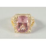 A GOOD 18CT GOLD MORGANITE AND DIAMOND RING.