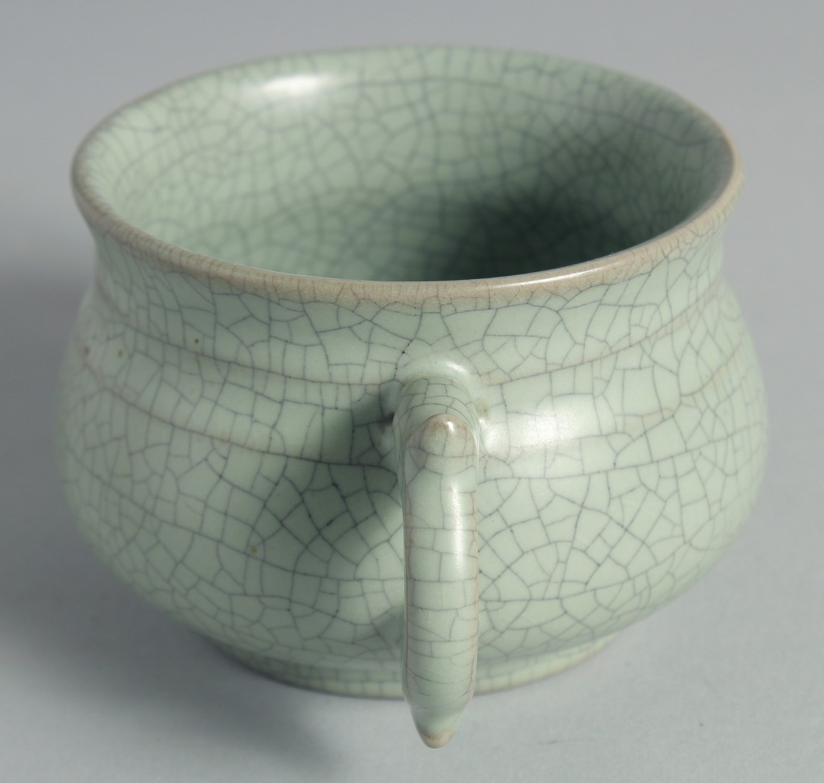 A CHINESE CELADON TWIN HANDLE CENSER, 15cm wide (handle to handle). - Image 4 of 6