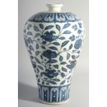 A LARGE CHINESE BLUE AND WHITE MEIPING VASE, painted with flora, 43cm high.