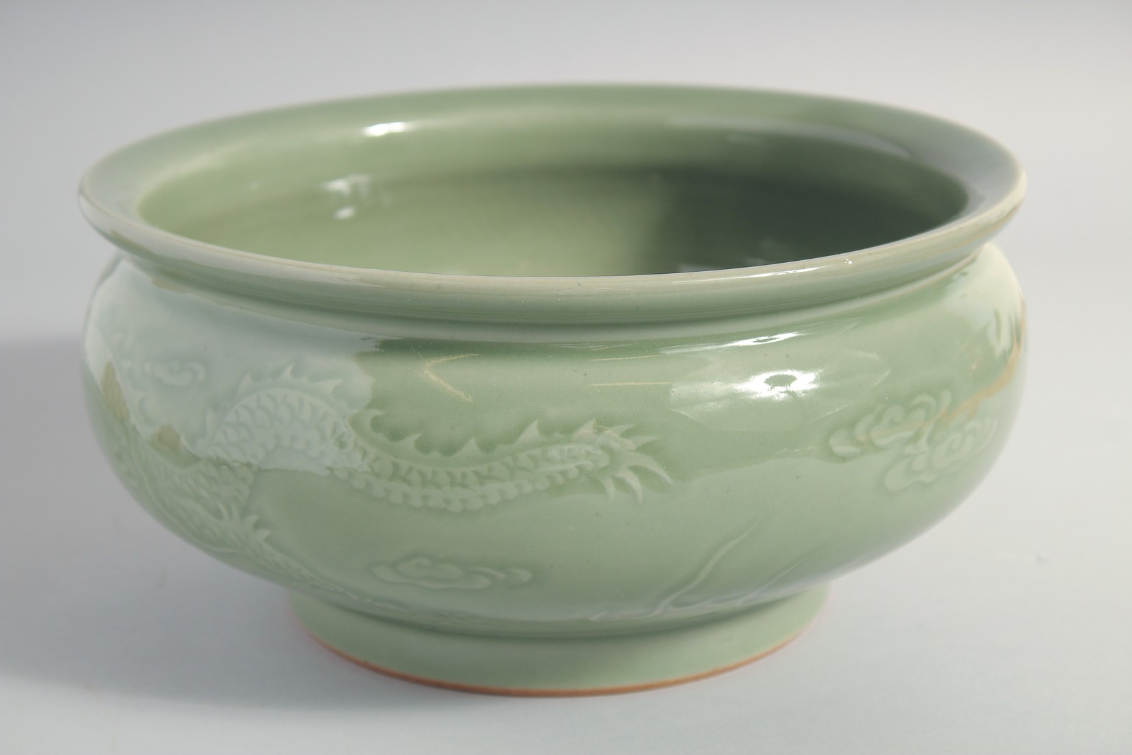 A LARGE CHINESE CELADON GLAZE BOWL, carved with dragon and the flaming pearl of wisdom, 25.5cm - Image 5 of 5
