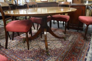 A GOOD GEORGE III DESIGN MAHOGANY OVAL TILT TOP BREAKFAST TABLE on a turned column support with four