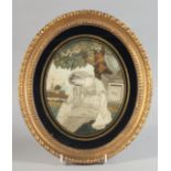 A GILT FRAMED OVAL GEORGIAN SILKWORK PICTURE OF A LADY a pedestal by her side. "Water". 10ins x