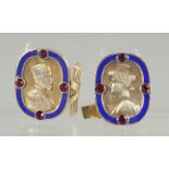 A PAIR OF RUSSIAN SILVER AND BLUE ENAMEL CUFF LINKS with a male and female bust.