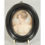 VICTORIAN SCHOOL. PORTRAIT MINIATURE OF MRS COUTTS, half length. 3.5ins x 2.75ins in a wooden