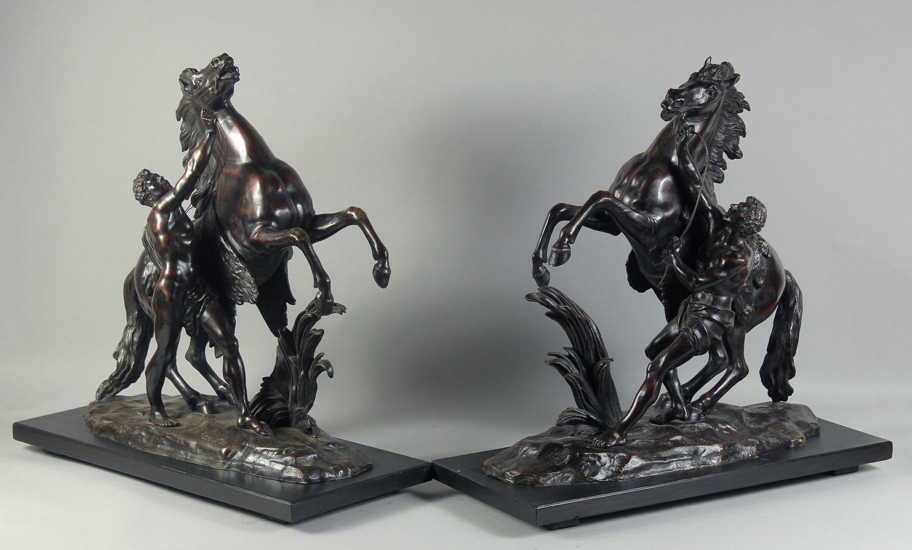 AFTER GUILLAUME COUSTOU. A SUPERB LARGE PAIR OF BRONZE CHEVAL DE MARLEY. Signed. 1ft 9ins high,