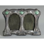 A SMALL ART DECO DESIGN SILVER DOUBLE PHOTOGRAPH FRAME. 3ins x 4ins.