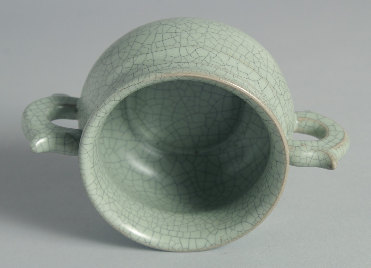 A CHINESE CELADON TWIN HANDLE CENSER, 15cm wide (handle to handle). - Image 3 of 6