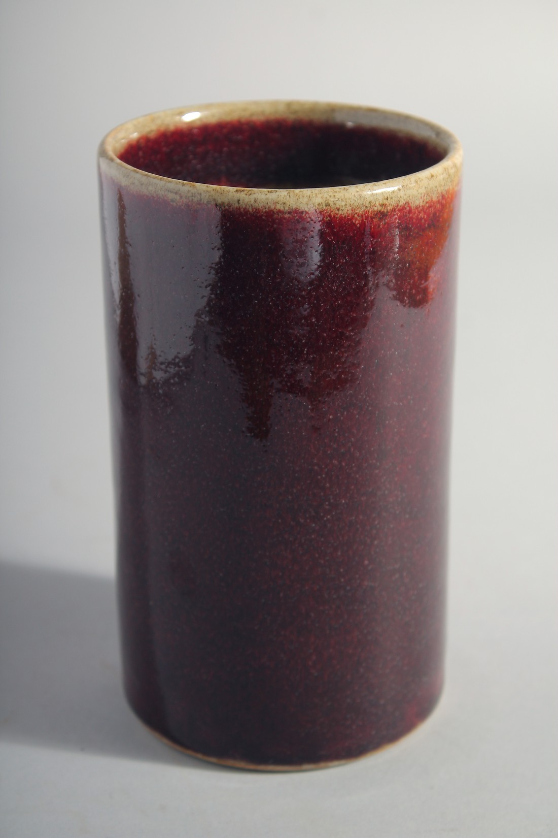 A CHINESE IRON RED GLAZE CYLINDRICAL BRUSH POT, 15cm high. - Image 4 of 5