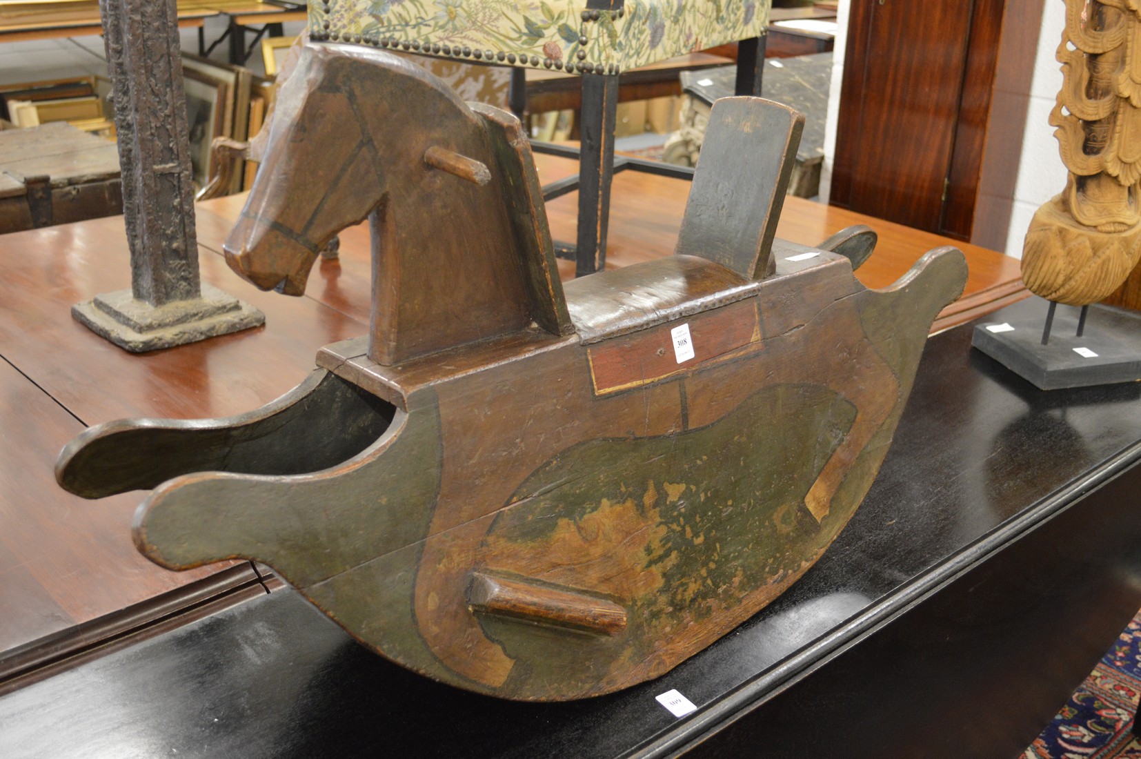 FOLK ART. A 19TH CENTURY PAINTED WOOD ROCKING HORSE. 2ft 3ins long.