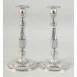 A SUPER PAIR OF ASPREY'S CAST SILVER CANDLESTICKS.