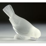 A LALIQUE FROSTED GLASS BIRD, wings open Signed, Lalique, France. 5.25ins long.