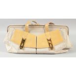 A GOOD BULGARI CREAM LEATHER BAG, two shades, two purses at the front. 44cm long x 20cm high