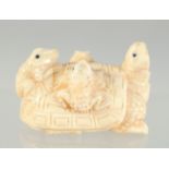 A CARVED BONE FROG NETSUKE. 5cm.