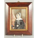 VICTORIAN SCHOOL PORTRAIT MINIATURE OF A LADY sitting in a chair knitting. 4.5ins x 3ins in a