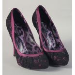 A PAIR OF DOLCE AND GABBANA BLACK AND PURPLE HIGH HEEL SHOES. Size 37.