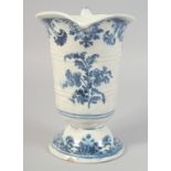 AN 18TH CENTURY ROUEN BLUE AND WHITE HELMET SHAPED JUG. 8ins high.
