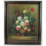 J. Gabriel (20th Century), A still life of mixed flowers in a vase on a ledge, oil on canvas,