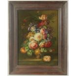 20th Century, A still life of mixed flowers in a vase on a ledge, oil on canvas, 16" x 12", (