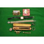 A pearl bracelet, cigarette holder, cased, enamel brooch, ladies wristwatch and other items.