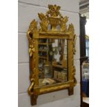 An Italian carved and gilded pier mirror.