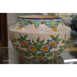 A colourfully decorated French pottery jardiniere.