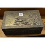 A Chinese embossed metal box.