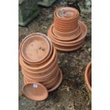 Terracotta plant pot saucers or stands.