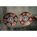 Two Imari plates.