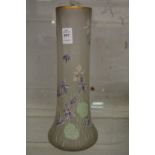 A floral enamel decorated opaque glass vase.