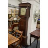 A 19th century oak and mahogany longcase clock with eight day movement and painted square dial.